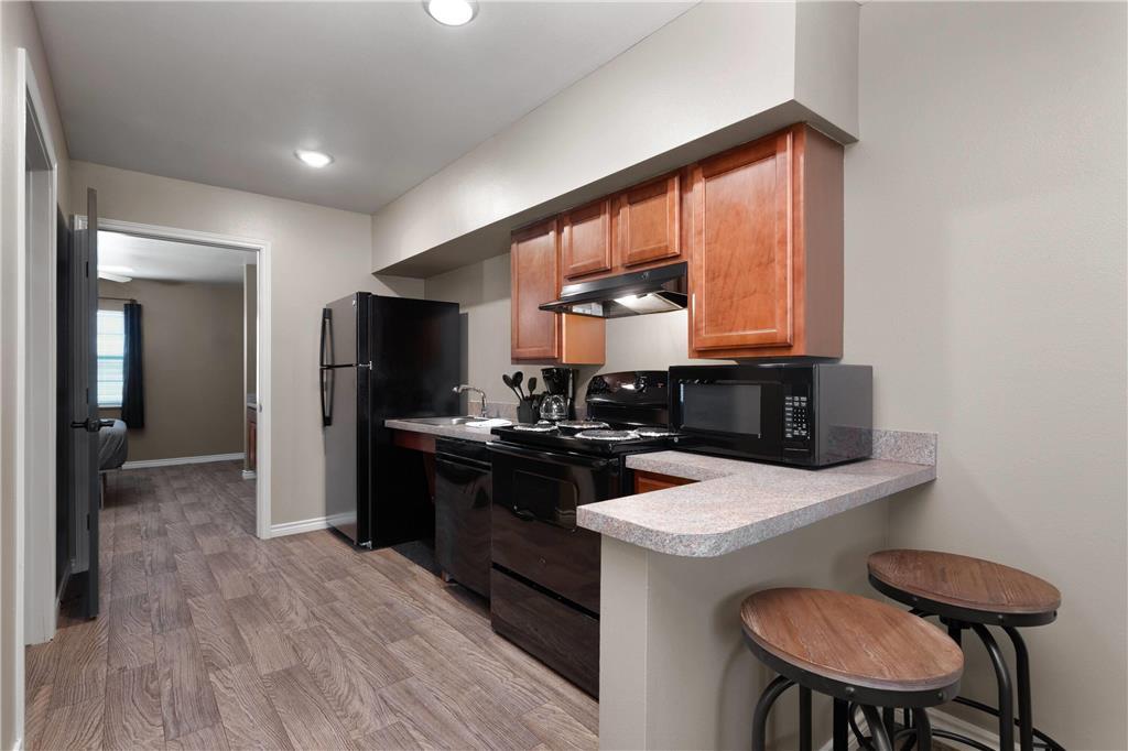 Eagle'S Den Suites Andrews A Travelodge By Wyndham Room photo