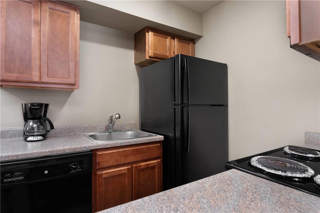 Eagle'S Den Suites Andrews A Travelodge By Wyndham Room photo